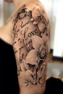 tatuagem de flores no braço