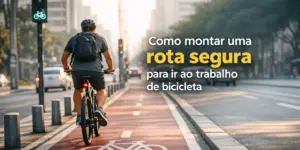 Ciclista em pista urbana com sinal verde para bicicleta durante manhã.
