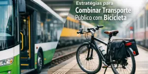 Ônibus verde e branco e bicicleta preta em estação com trem ao fundo
